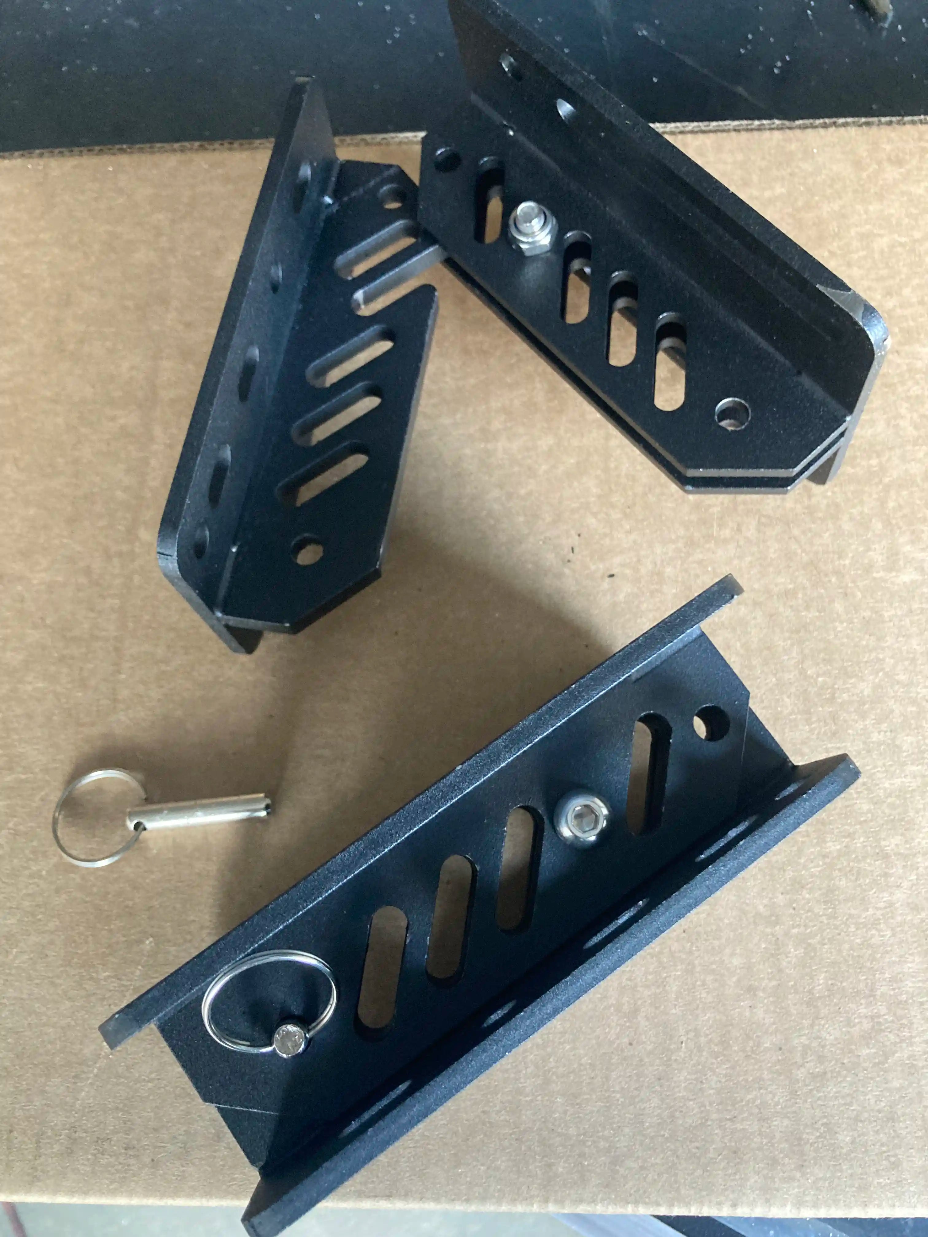 Black metal quick release awning brackets for vehicle awning and overland awnings